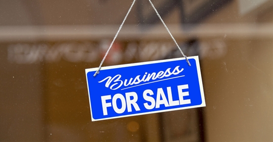 business for sale sign in window